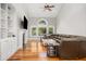 Bright living room features vaulted ceilings, a ceiling fan, and a large sectional sofa at 2645 Crooked Stick Ln, Mount Pleasant, SC 29466