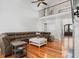 Expansive living room with tall ceilings, a ceiling fan, a large sectional, and a view of a second-story balcony at 2645 Crooked Stick Ln, Mount Pleasant, SC 29466