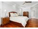 Elegant main bedroom with hardwood floors, stylish furnishings, and ample natural light from large windows at 2645 Crooked Stick Ln, Mount Pleasant, SC 29466