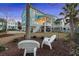 Home's expansive backyard features an inviting outdoor space, mature trees, and lush lawn at 2924 Tranquility Rd, Mount Pleasant, SC 29466