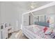 Airy bedroom with a loft bed, a white color scheme, and a vanity, providing a clean and versatile living space at 2924 Tranquility Rd, Mount Pleasant, SC 29466