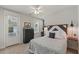 Cozy bedroom with a unique headboard, a dark dresser, and a door to the outside, offering a private retreat at 2924 Tranquility Rd, Mount Pleasant, SC 29466