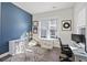 Cozy bedroom or playroom featuring natural light, stylish decor, and ample storage solutions at 2924 Tranquility Rd, Mount Pleasant, SC 29466