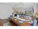 Charming dining room with hardwood floors, bench seating, and views of the living areas at 2924 Tranquility Rd, Mount Pleasant, SC 29466