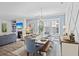 Elegant dining room featuring natural light, stylish decor, and hardwood floors at 2924 Tranquility Rd, Mount Pleasant, SC 29466