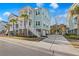 Charming beach house with a spacious driveway and three stories of porches and decks at 2924 Tranquility Rd, Mount Pleasant, SC 29466