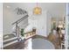 Welcoming foyer with hardwood floors, staircase, and convenient mudroom area, perfect for organization at 2924 Tranquility Rd, Mount Pleasant, SC 29466