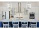 Modern kitchen with white cabinets, stainless steel appliances, and a spacious center island at 2924 Tranquility Rd, Mount Pleasant, SC 29466
