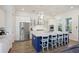 Bright, open kitchen featuring stainless appliances, hardwood floors and island with seating at 2924 Tranquility Rd, Mount Pleasant, SC 29466