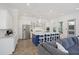 Modern kitchen with stainless steel appliances, hardwood floors, and a center island at 2924 Tranquility Rd, Mount Pleasant, SC 29466
