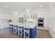 Modern kitchen featuring a blue center island with white marble countertops and stainless steel appliances at 2924 Tranquility Rd, Mount Pleasant, SC 29466