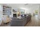 Comfortable living room featuring a fireplace, built-in shelving, and a large sectional sofa at 2924 Tranquility Rd, Mount Pleasant, SC 29466