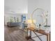Inviting living room with console table, mirror, hardwood floors, and comfortable seating area at 2924 Tranquility Rd, Mount Pleasant, SC 29466