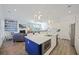 Bright, open concept living space with modern kitchen and island; adjacent to a comfortable living room at 2924 Tranquility Rd, Mount Pleasant, SC 29466