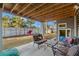 Covered outdoor living space with comfortable seating and backyard views at 2924 Tranquility Rd, Mount Pleasant, SC 29466