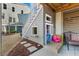 Charming outdoor playhouse under raised home, complete with miniature furniture at 2924 Tranquility Rd, Mount Pleasant, SC 29466