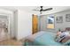 Charming bedroom featuring natural light, hardwood floors, and a unique barn-style door at 2957 Alabama Dr, North Charleston, SC 29405