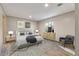 Relaxing bedroom with neutral walls and decor, natural light, and hardwood floors with modern area rug at 314 Hickory Nut Way, Cross, SC 29436