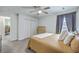 Bedroom with comfortable queen bed, natural light, closet, and access to an ensuite bathroom at 333 Price St, Goose Creek, SC 29445