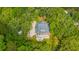 Overhead view of beautiful home with a patio and lush trees, perfect for relaxation at 3635 Pandora Dr, Mount Pleasant, SC 29466