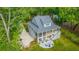 Stunning aerial view of a beautifully landscaped property featuring a cozy patio and screened porch at 3635 Pandora Dr, Mount Pleasant, SC 29466
