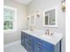 Stylish bathroom with double vanity, marble countertop, and modern fixtures at 3635 Pandora Dr, Mount Pleasant, SC 29466