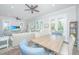 Open-concept dining area connects to the living room, offering views of the seating and the outdoors at 3635 Pandora Dr, Mount Pleasant, SC 29466