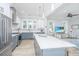 Modern kitchen featuring a large island, stainless steel appliances, and open layout to living area at 3635 Pandora Dr, Mount Pleasant, SC 29466