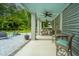 Inviting outdoor patio with a seating area and scenic views of the lush backyard at 3635 Pandora Dr, Mount Pleasant, SC 29466