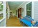 Cozy front porch with a bench and rocking chairs, offering a relaxing outdoor space at 3635 Pandora Dr, Mount Pleasant, SC 29466