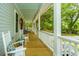 Inviting front porch with rocking chairs and seating, perfect for relaxing outdoors at 3635 Pandora Dr, Mount Pleasant, SC 29466