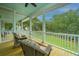 Relaxing screened porch with comfortable seating, perfect for enjoying the serene outdoor views and fresh air at 3635 Pandora Dr, Mount Pleasant, SC 29466