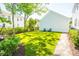 Beautiful backyard featuring well-manicured lawn and mature trees for shade and outdoor relaxation at 3688 Goodwater St, Mount Pleasant, SC 29466