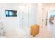Bright bathroom featuring a frameless glass shower, white subway tile and marble floors at 3688 Goodwater St, Mount Pleasant, SC 29466