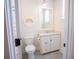 Bright bathroom featuring a modern vanity with marble countertop and a cute rainbow wall decoration at 3688 Goodwater St, Mount Pleasant, SC 29466