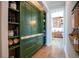 Butler pantry features beautiful millwork, marble countertop and open shelving at 3688 Goodwater St, Mount Pleasant, SC 29466