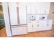 Bright eat-in kitchen with white cabinets and luxury stainless steel appliances at 3688 Goodwater St, Mount Pleasant, SC 29466