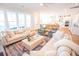 Spacious living room with lots of natural light flowing in from the large windows at 3688 Goodwater St, Mount Pleasant, SC 29466