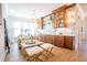 Elegant living room with a stylish bar, cozy seating, and bright natural light at 3688 Goodwater St, Mount Pleasant, SC 29466