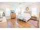 Bright primary bedroom offers ample natural light and stylish decor at 3688 Goodwater St, Mount Pleasant, SC 29466