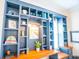 Detailed view of custom built-in shelving in a modern home office at 3688 Goodwater St, Mount Pleasant, SC 29466
