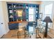 Stylish office featuring custom cabinetry, a glass desk, and elegant decor at 3688 Goodwater St, Mount Pleasant, SC 29466