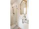 Modern bathroom features glass shower, designer mirror, and stylish fixtures at 4 Catfiddle St, Charleston, SC 29403