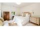 Cozy bedroom with comfortable bed, classic furniture, and ample natural light at 4 Catfiddle St, Charleston, SC 29403