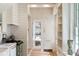 Bright open kitchen with modern appliances and a doorway view to the bedroom area at 4 Catfiddle St, Charleston, SC 29403