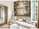 Bright living room features stylish art piece, comfortable seating, and sunlit window at 4 Catfiddle St, Charleston, SC 29403