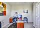 Bright office space featuring modern desk, comfortable seating, and stylish decor, creating a productive workspace at 404 Snowy Plover Ln, Summerville, SC 29486