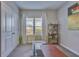 Bright home office with large window, closet, shelving, and neutral carpet at 404 Snowy Plover Ln, Summerville, SC 29486