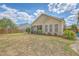 Lovely backyard featuring a screened porch and lawn, perfect for outdoor enjoyment at 405 Decatur Dr, Summerville, SC 29486