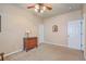 Inviting bedroom featuring a ceiling fan, window with blinds and wooden dresser at 405 Decatur Dr, Summerville, SC 29486